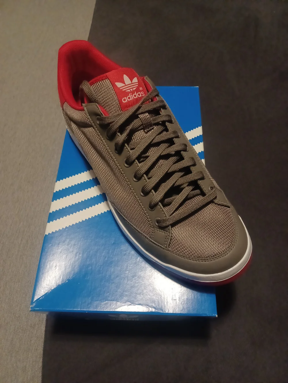 Adidas Men’s Rod Laver Grey Low-Top Sneaker with Red Accents